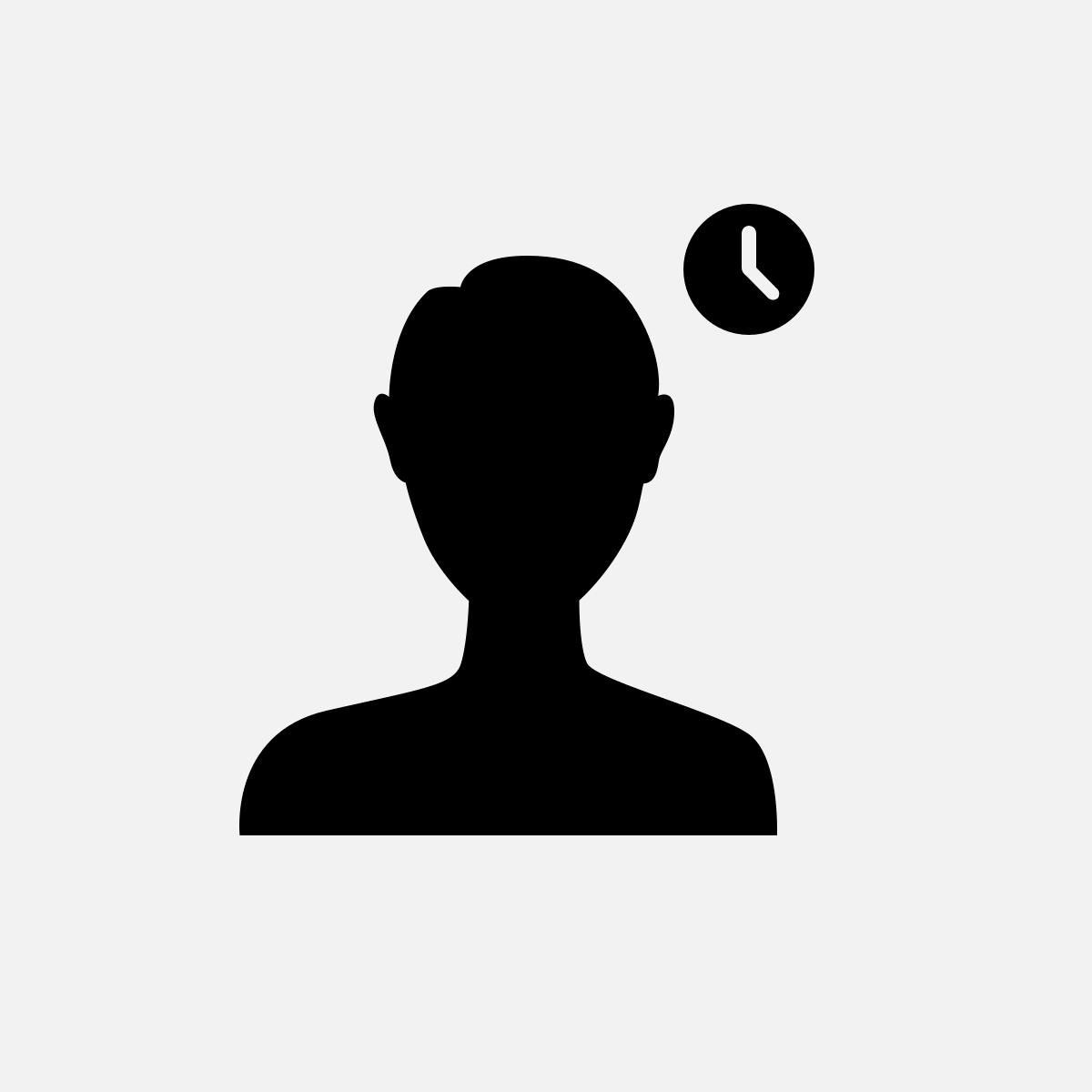 Silhouette of a person in front of a clock
